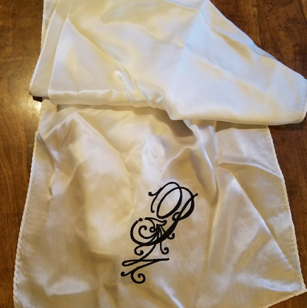 "P" embroidered scarf.